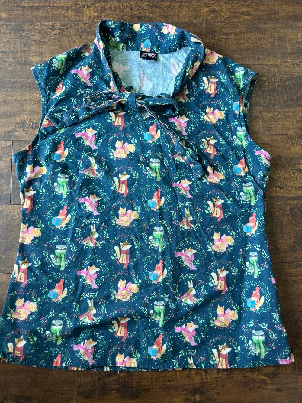Retrolicious Teal Fox Print Tie-Neck Sleeveless Blouse